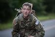 U.S. Army Reserve Competitor, Staff Sgt. Derek Selden, U.S Army Civil Affairs and Psychological Operations Command, runs during a ruck march at Joint Base McGuire-Dix-Lakehurst, New Jersey, Sept. 5, 2024. Selden is participating in an annual competition that brings together the best Soldiers and squads from across the U.S. Army Reserve to earn the title of 