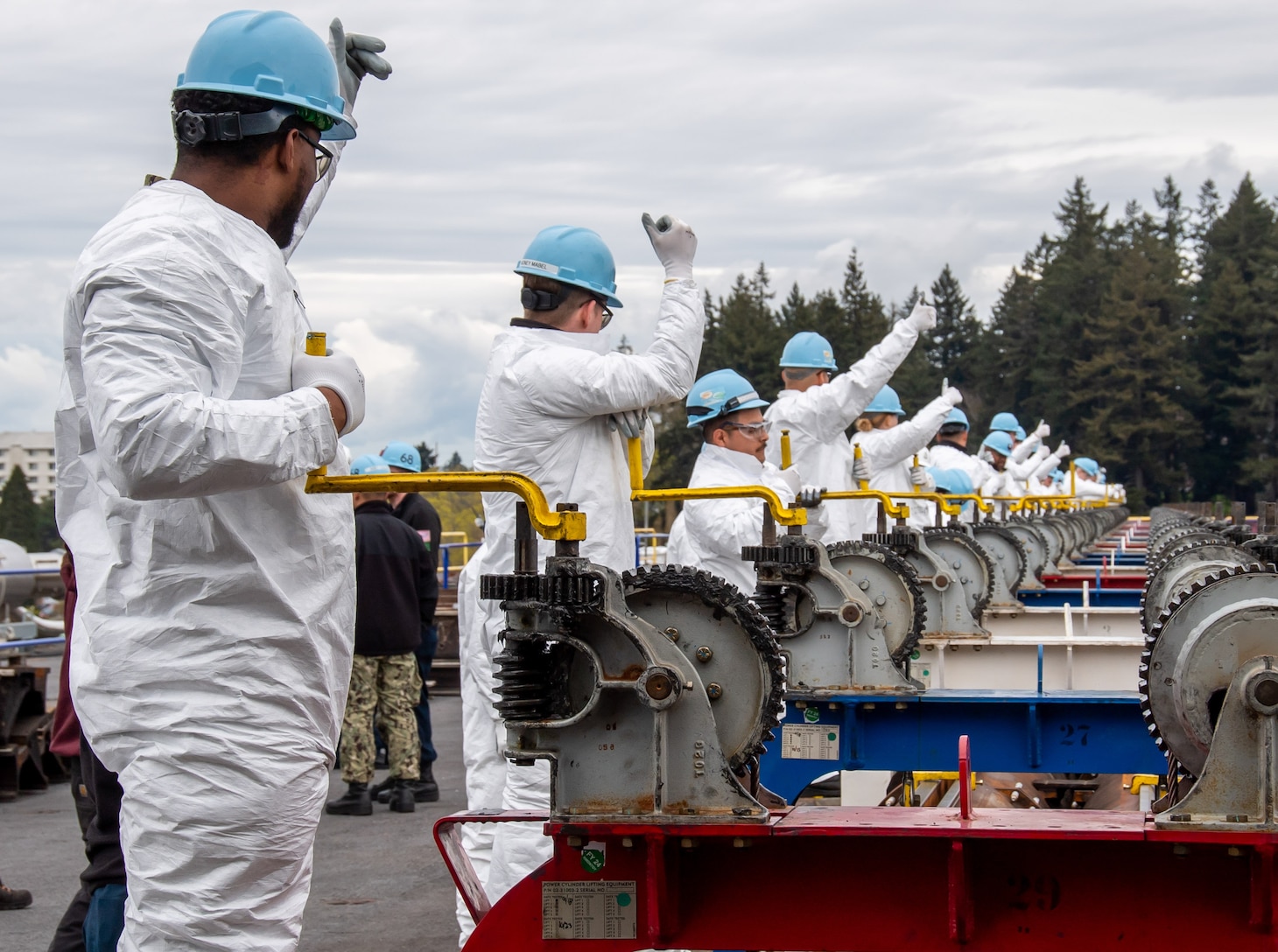 Sailors prepare to lower the catapult of the aircraft carrier USS Nimitz (CVN 68) while in port at Naval Base Kitsap-Bremerton, Washington, March 5. Nimitz is in port for a scheduled planned incremental availability period.