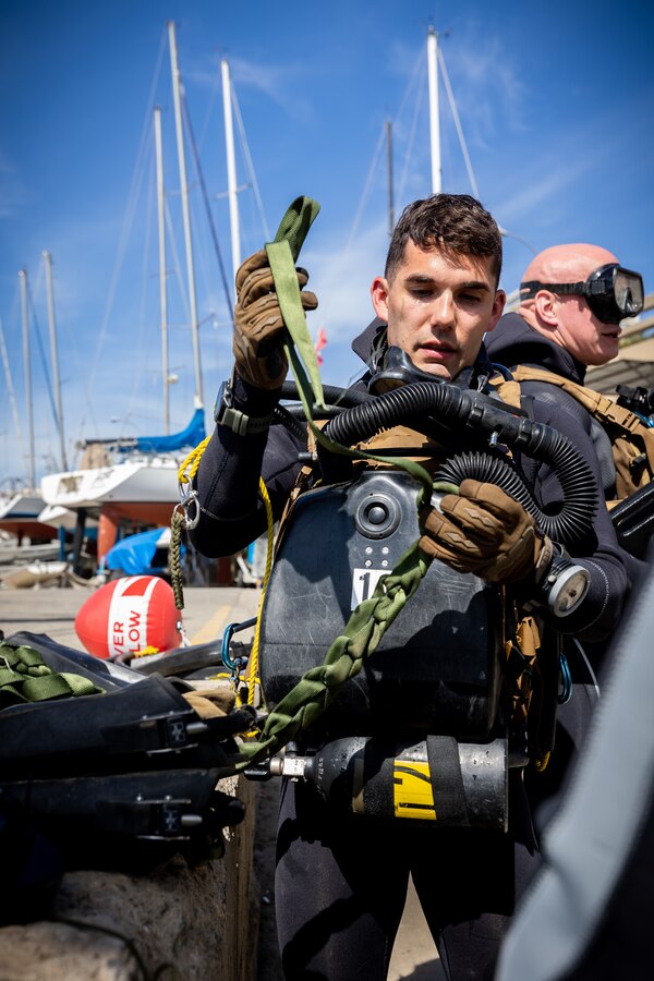 U.S. Marine Corps Sgt. Benjamin Walker, a diver with 4th Reconnaissance Battalion, 4th Marine Division, prepares to conduct dive operations during Exercise UNITAS LXV in Vina del Mar, Chile, Sept. 5, 2024. The dive operations consisted of several iterations of timed underwater navigation at 20 feet below sea level conducted at various distances. UNITAS focuses on strengthening our existing regional partnerships and encouraging the establishment of new relationships through the exchange of maritime mission-focused knowledge and expertise. (U.S. Marine Corps photo by Lance Cpl. Madisyn Paschal)