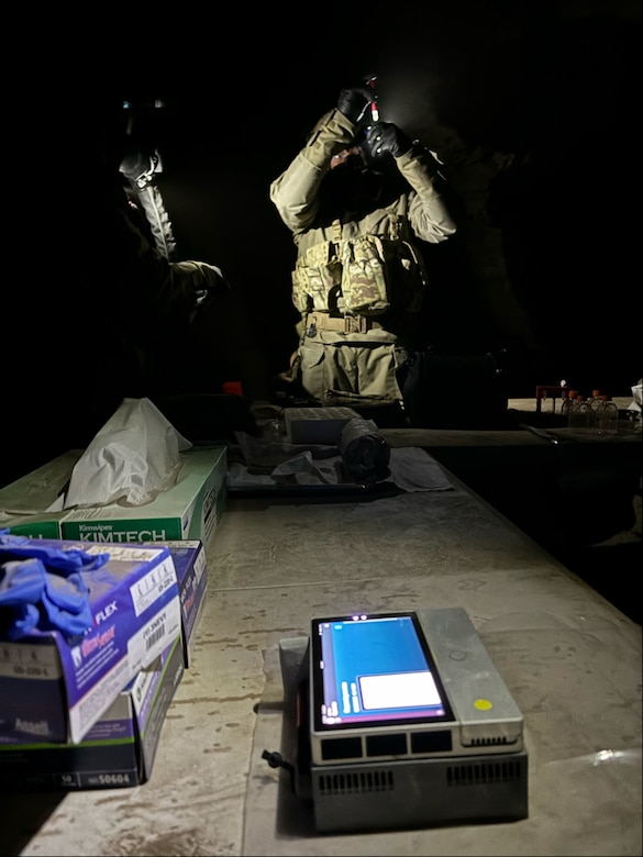 Soldiers from the 82d Chemical Reconnaissance Detachment analyze biological agents "discovered" during a three-day, multi-agency exercise that took place at ERDC’s Permafrost Tunnel Research Facility in Fox, Alaska. One of the main objectives of the exercise was to help Soldiers familiarize themselves with Far-Forward Advanced Sequencing Technology (F-FAST), which was developed by DTRA and U.S. Army DEVCOM to quickly detect, analyze and sequence biological agents while still in the field.
