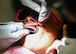 A student at the Air Force Oral Hygiene Course at Joint Base San Antonio-Lackland, Texas, performs a dental cleaning on a patient during the hands-on training phase at Dunn Dental Clinic on Joint Base San Antonio-Lackland, Texas Aug 28, 2024.