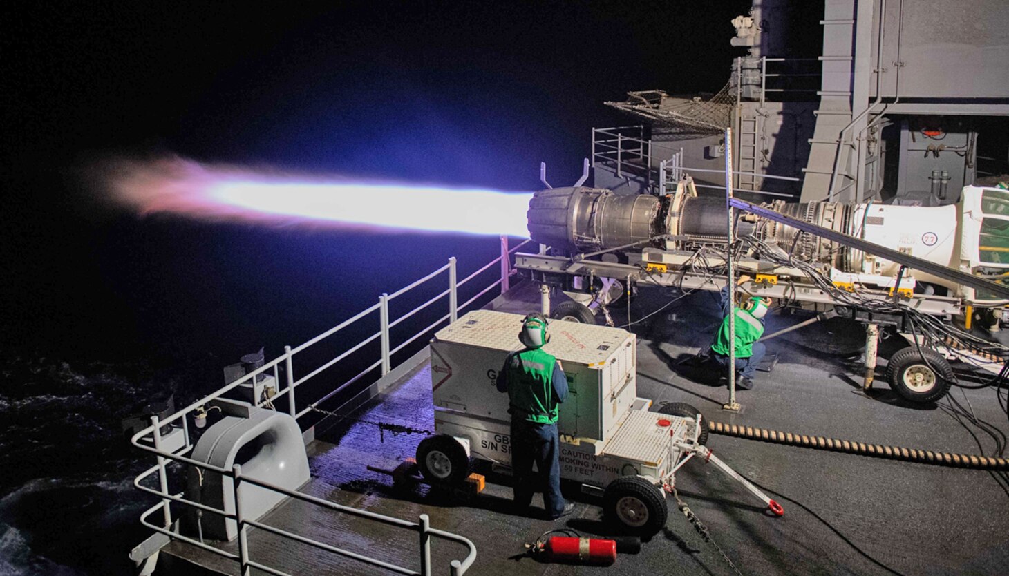 Sailors assigned to the Nimitz-class aircraft carrier USS George H.W. Bush (CVN 77) test a jet engine cell on the ship’s fantail. CharLES is reducing the time and cost it takes to simulate the aerodynamics inside an aircraft’s engine and troubleshoot problems.