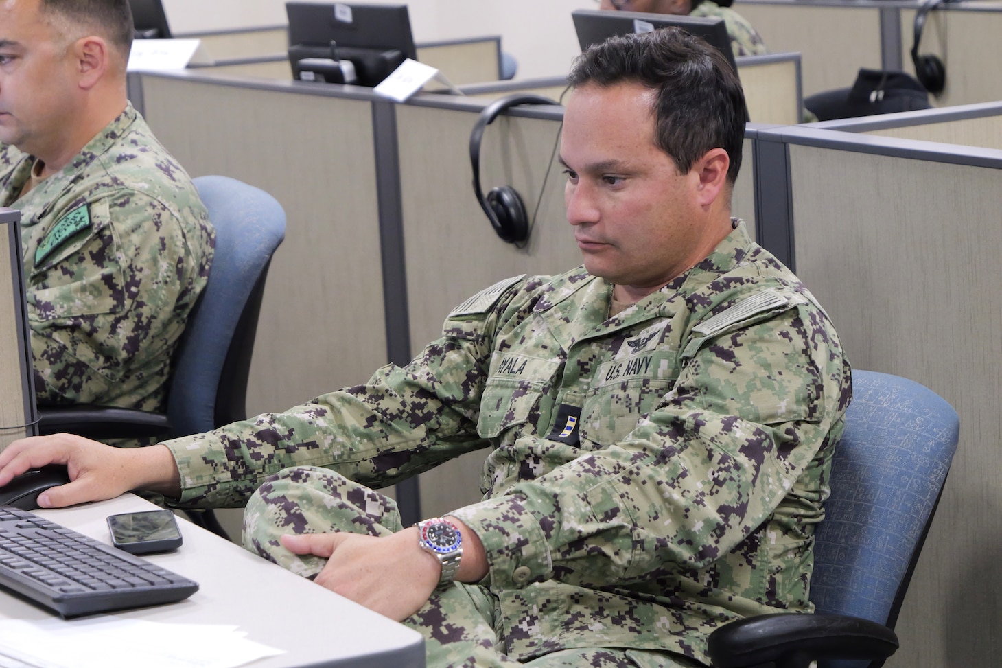 CWO2 Carlos Ayala works on an assignment for the JASMMM course.