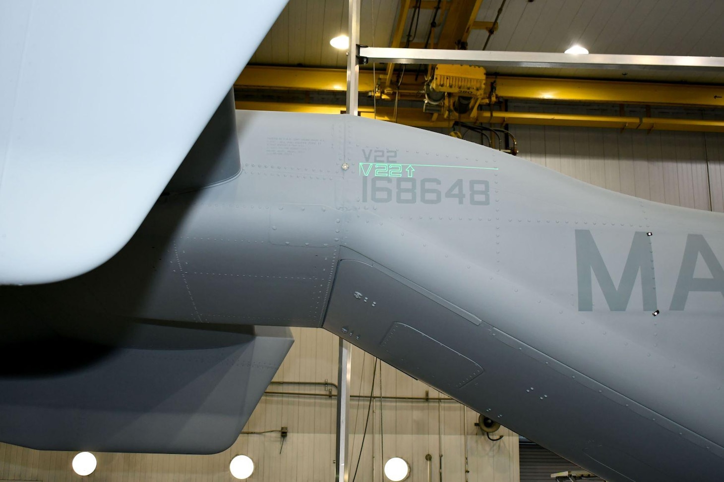 Fleet Readiness Center East is working to streamline the final finish process within the depot’s Aircraft Clean and Paint Shop with the adoption of a laser projection system. The system acts as a guide for the precise placement of markings and insignia on aircraft by projecting their outlines onto the aircraft.