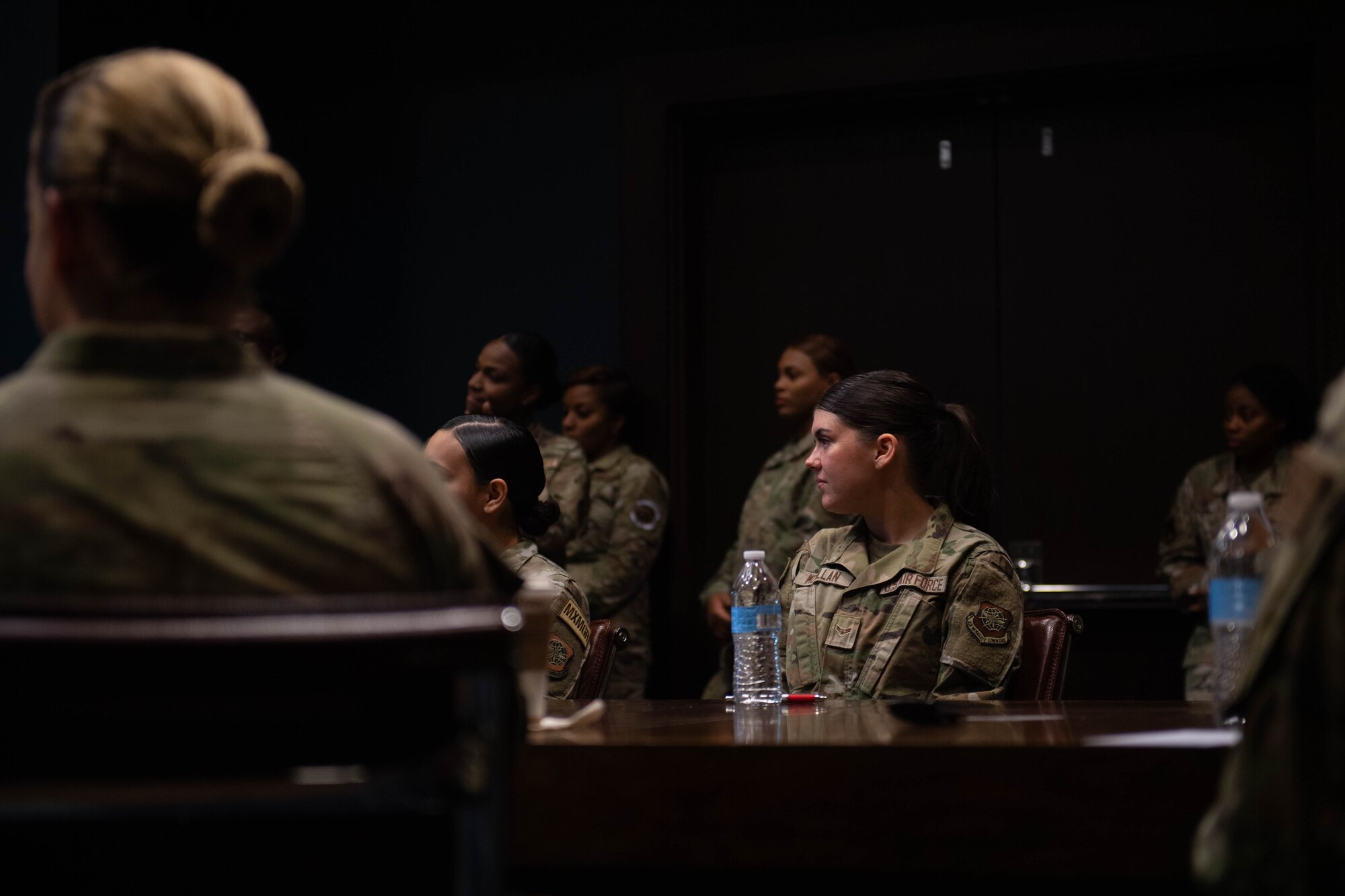 U.S. Air Force Airman 1st Class Madison McMillan, 436th Health Care Operations Squadron mental health technician, listens to U.S. Air Force Chief Master Sgt. Jamie Newman, Air Mobility Command command chief, and Chief Master Sgt. Thomas Blount, 18th Air Force command chief, discuss career advice and professional development during the 2024 Air Force Sergeants Association Summit at Houston, Texas, Aug. 13, 2024. The 2024 AFSA Summit is an international convention and professional development symposium. Attendees received professional education and development learning opportunities from senior leaders around the U.S. military. (U.S. Air Force photo by Tech. Sgt. J.D. Strong II)