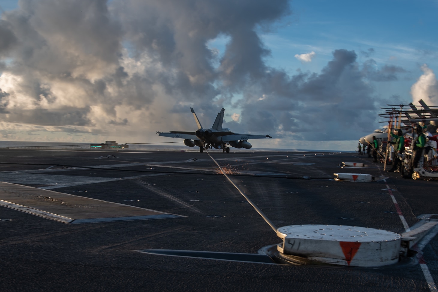 200702-N-ML137-1115 PHILIPPINE SEA (July 2, 2020) An F/A-18E Super Hornet attached to the Royal Maces of Strike Fighter Squadron (VFA) 27 lands on the flight deck of the Navy’s only forward-deployed aircraft carrier USS Ronald Reagan (CVN 76), maintaining Ronald Reagan’s tactical presence on the seas. Ronald Reagan is the flagship of Carrier Strike Group (CSG) 5. The USS Nimitz (CVN 68) and Ronald Reagan CSGs are conducting dual-carrier operations in the Philippine Sea as the Nimitz Carrier Strike Force.