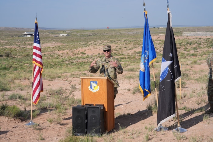 Col. Jeremy Raley, director of the Air Force Research Laboratory, or AFRL’s, Space Vehicles Directorate, delivers remarks during a groundbreaking ceremony July 29, 2024, at Kirtland Air Force Base, N.M. The ceremony commenced construction for a Re-Entry Vehicle Integration Laboratory, or REVIL, that will serve AFRL’s Nuclear Mission branch and provide lab space for integrating test units for next-generation nuclear research and technology. (U.S. Air Force photo / Jessie Perkins)