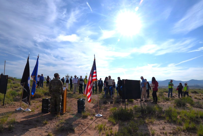 1st Lt. Quincy Zawadzky calls an audience to witness a groundbreaking ceremony hosted by the Air Force Research Laboratory, or AFRL, at Kirtland Air Force Base, N.M July 29, 2024. The ceremony commenced construction for a Re-Entry Vehicle Integration Laboratory, or REVIL, that will serve AFRL’s Nuclear Mission branch and provide lab space for integrating test units for next-generation nuclear research and technology. (U.S. Air Force photo / Jessie Perkins)