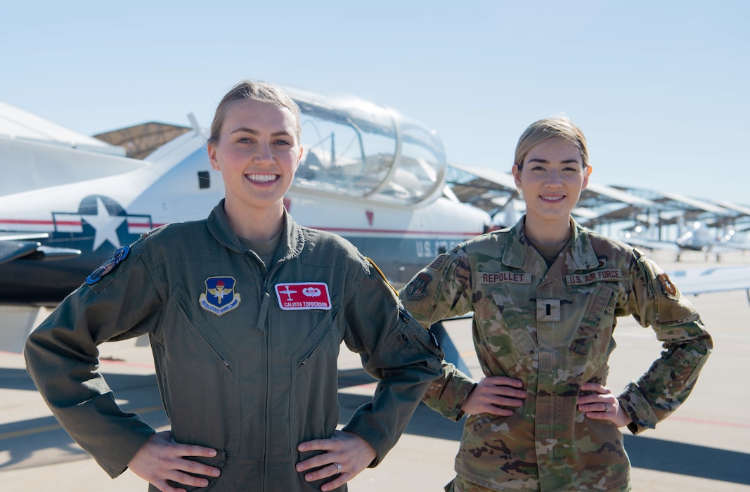 2nd Lt. Calista Torbenson, left, a student pilot at Vance Air Force Base, was selected as a 2022 LEAP Scholar, with a little help from 1st Lt. Saribel Repollet, right, a veteran of the language program.