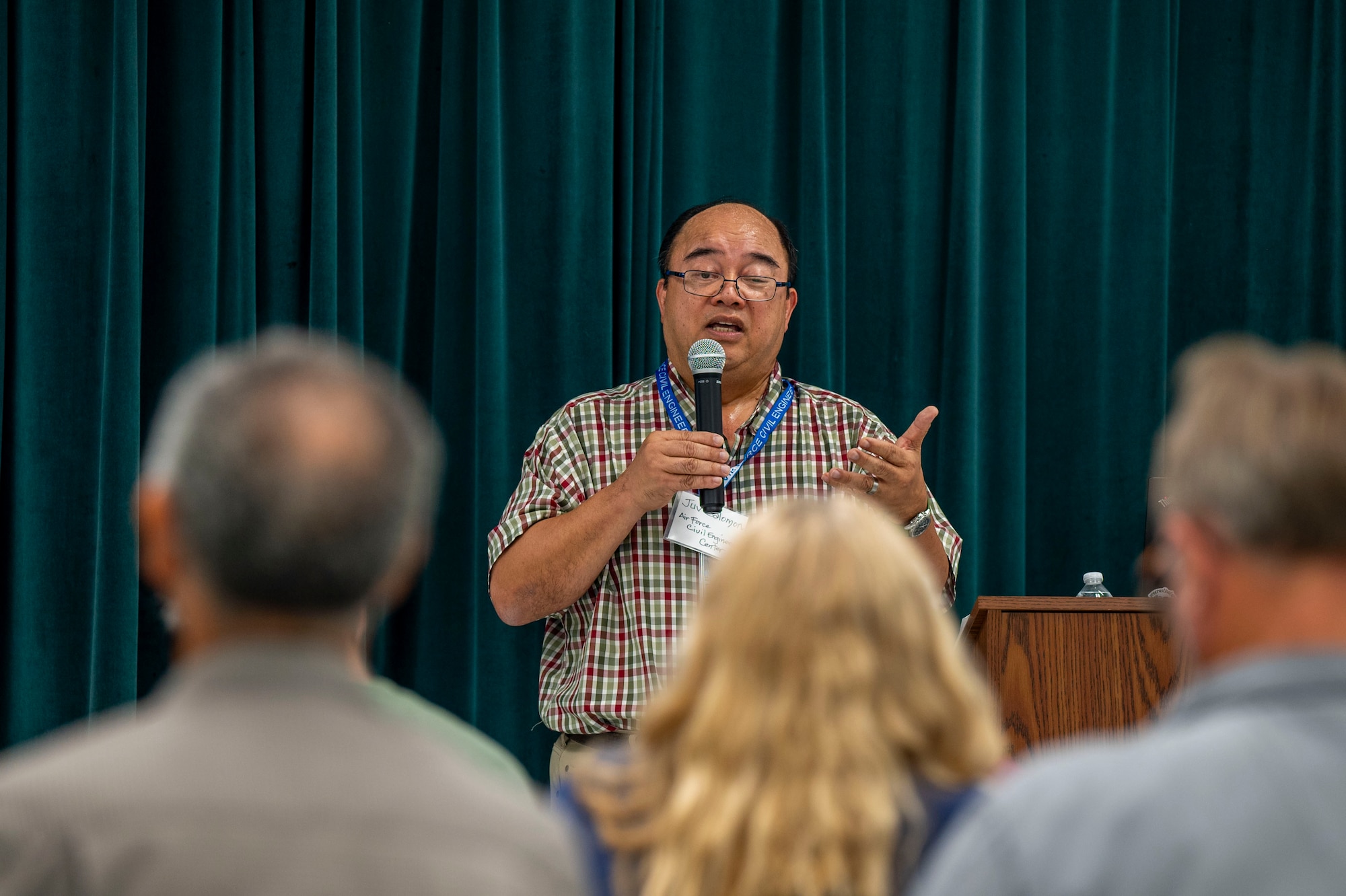 A man speaks to a crowd.