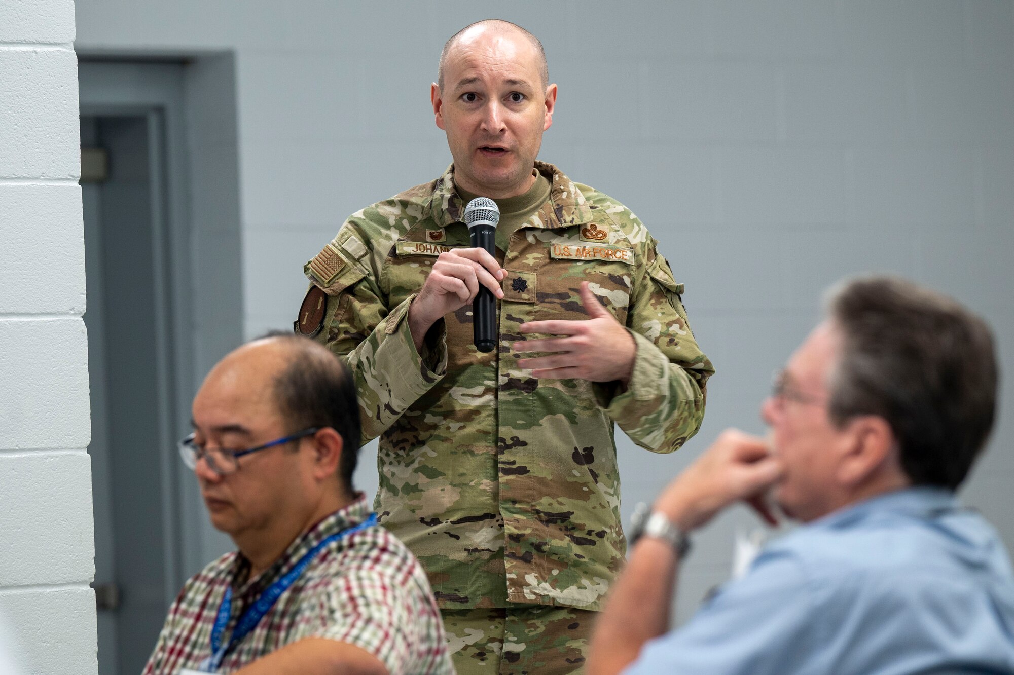 A man speaks to a crowd.