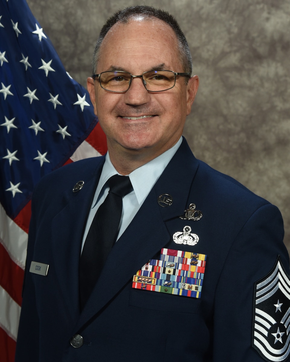 U.S. Air Force Chief Master Sgt. Joseph Cook poses for an official photo at Sumpter Smith Joint National Guard Base, Alabama, Aug. 20, 2024. (U.S. Air National Guard photo by Staff Sgt. Nicholas Faddis)