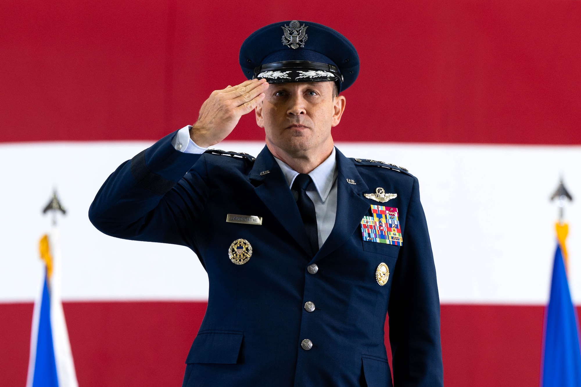 U.S. Air Force Gen. John D. Lamontagne laughs during a speech at the Air Mobility Command Change of Command ceremony at Scott Air Force Base, Illinois, Sept. 9, 2024. Lamontagne is the 16th commander of AMC, as it continues to provide rapid global mobility and sustainment for America’s Armed Forces.
