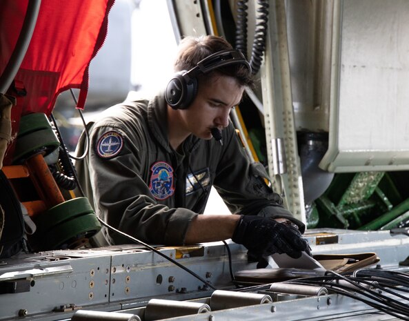 U.S. Marine Corps Cpl. Garrett A. Sloan, a loadmaster with Marine Aerial Refueler Transport Squadron (VMGR) 153, Marine Aircraft Group 24, 1st Marine Aircraft Wing (MAW) refuels a KC-130J during Exercise Evergreen 2024 at Joint Base Lewis-McChord, Wash., Aug. 14, 2024. Exercise Evergreen 2024 enabled VMGR-153 to implement comprehensive training, including joint operations with the U.S. Army and Air Force, to maintain the squadron’s high level of proficiency in supporting 1st MAW operations across the Indo-Pacific region. (U.S. Marine Corps photo by Cpl. Anabelle Reed-O’Brien)