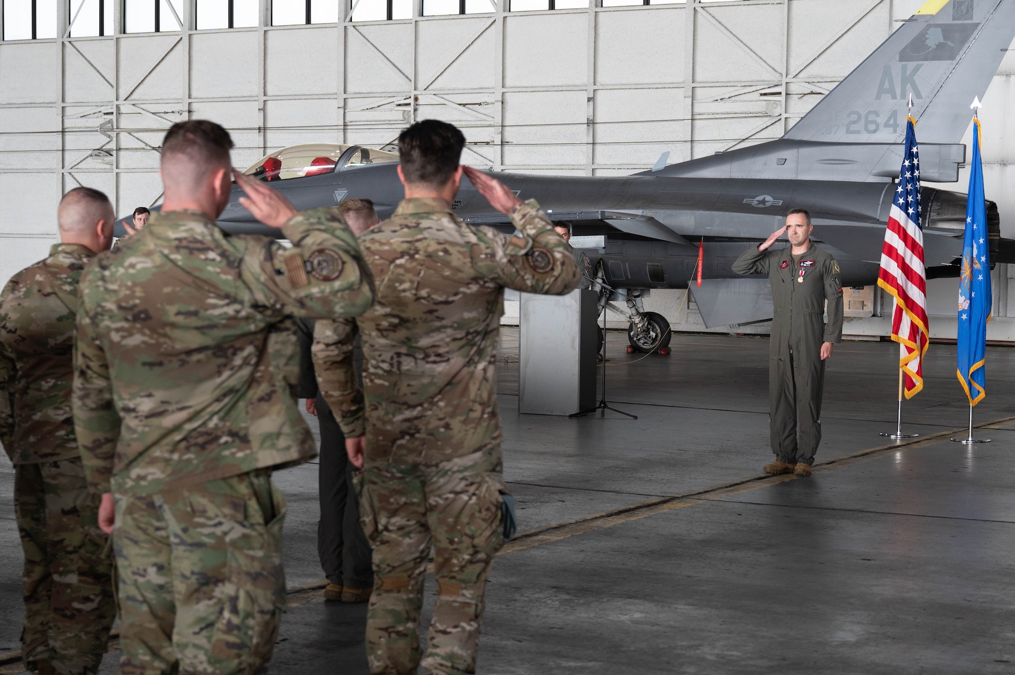 U.S. Air Force Lt. Col. James Collins II, 353rd Combat Training Squadron outgoing commander,   renders a final salute to the formation during a change of command ceremony at Eielson Air Force Base, Alaska, Sep. 6, 2024.