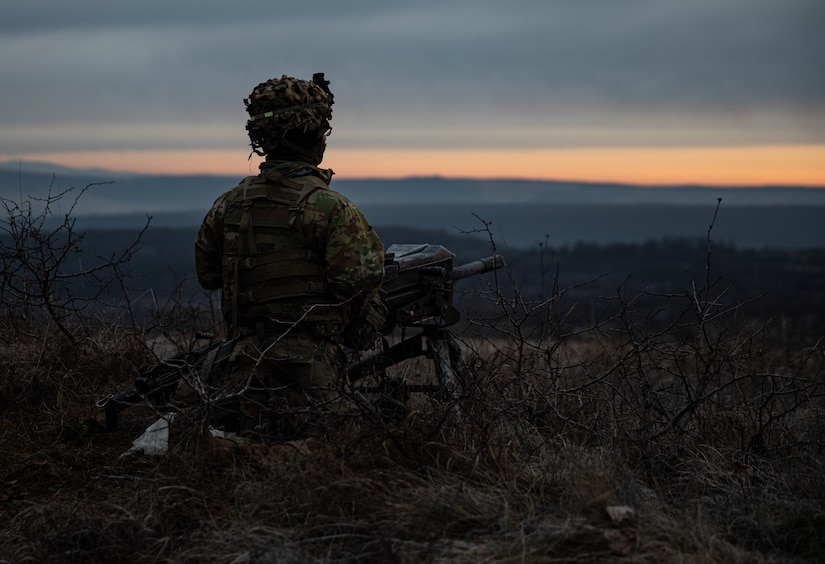 A Soldier assigned to the 39th Brigade Engineer Battalion, 2nd Brigade Combat Team, 101st Airborne Division (Air Assault), pulls security during Exercise Bull Fury on Jan. 16, 2023, in Romania. 101st units will support V Corps mission to reinforce NATO’s eastern flank and engage in multinational exercises with partners across the European continent to reassure our Nations allies. (U.S. Army photo by Staff Sgt. Malcolm Cohens-Ashley, 2nd Brigade Combat Team Public Affairs.)