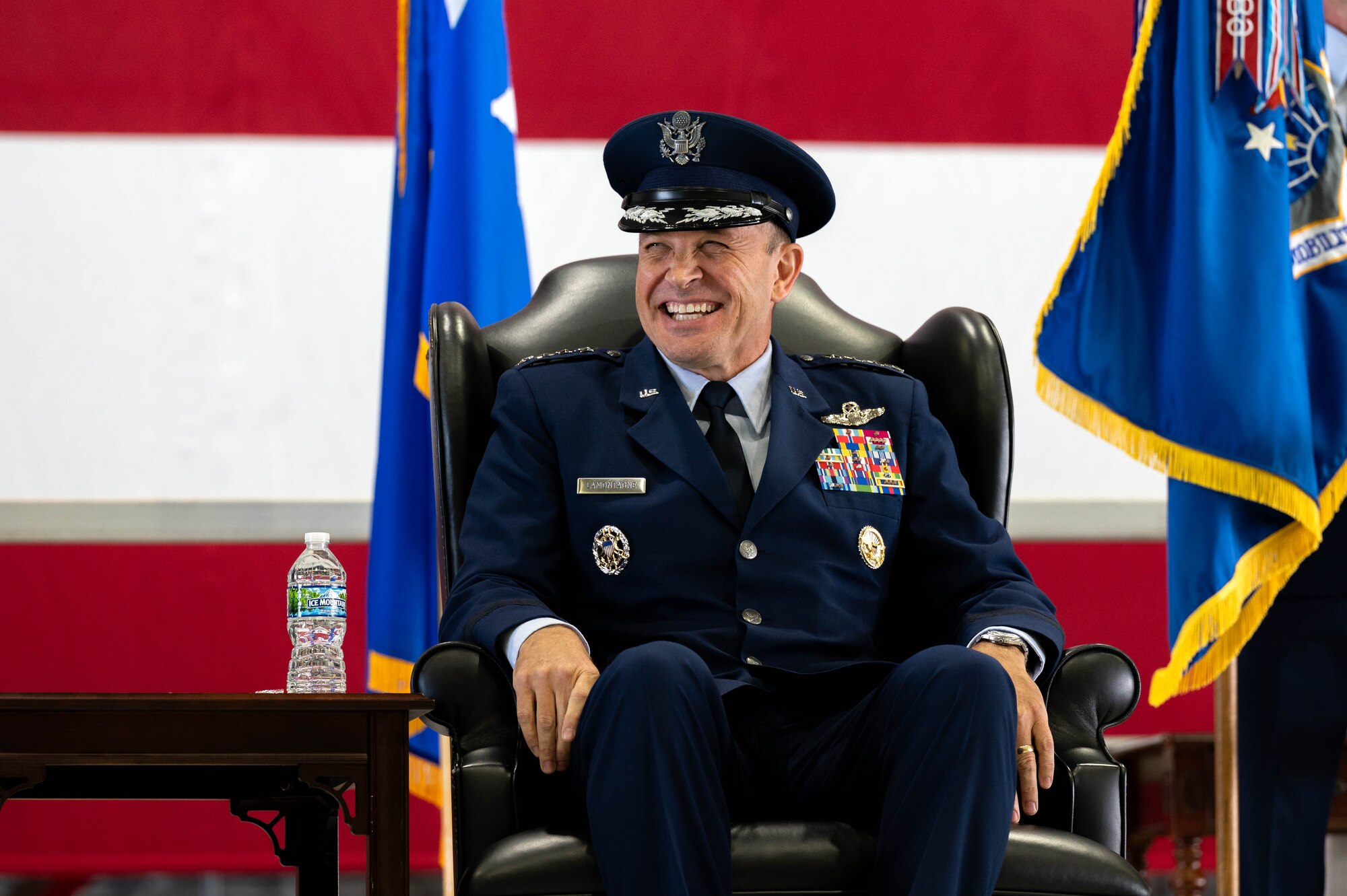 U.S. Air Force Gen. John D. Lamontagne laughs during a speech at the Air Mobility Command Change of Command ceremony at Scott Air Force Base, Illinois, Sept. 9, 2024. Lamontagne is the 16th commander of AMC, as it continues to provide rapid global mobility and sustainment for America’s Armed Forces.
