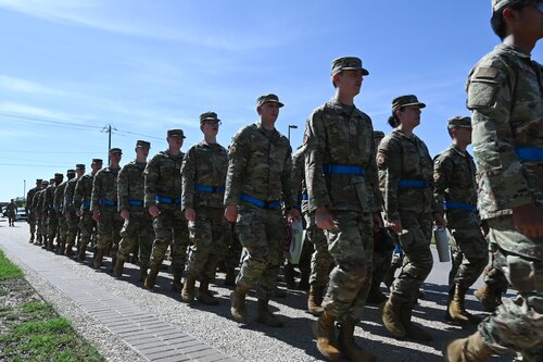 U.S. Air Force Airmen assigned to the 315th Training Squadron march back to their squadron after a day of intelligence classes at Goodfellow Air Force Base, Texas, May 8, 2024. The 315th TRS’s mission is to train, educate and inspire the future intelligence, surveillance and reconnaissance warriors. (U.S. Air Force photo by Airman 1st Brian Lummus)