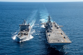 USS Boxer (LHD 4) replenishes from the New Zealand oiler HMNZS Aotearoa (A11) in the Korea Strait during Exercise Ssang Yong 24.