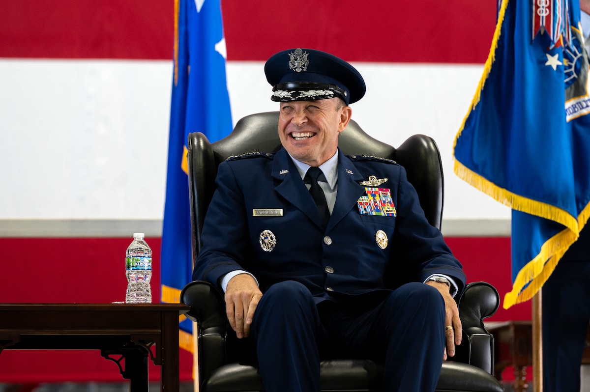 U.S. Air Force Gen. John D. Lamontagne laughs during a speech at the Air Mobility Command Change of Command ceremony at Scott Air Force Base, Illinois, Sept. 9, 2024. Lamontagne is the 16th commander of AMC, as it continues to provide rapid global mobility and sustainment for America’s Armed Forces.