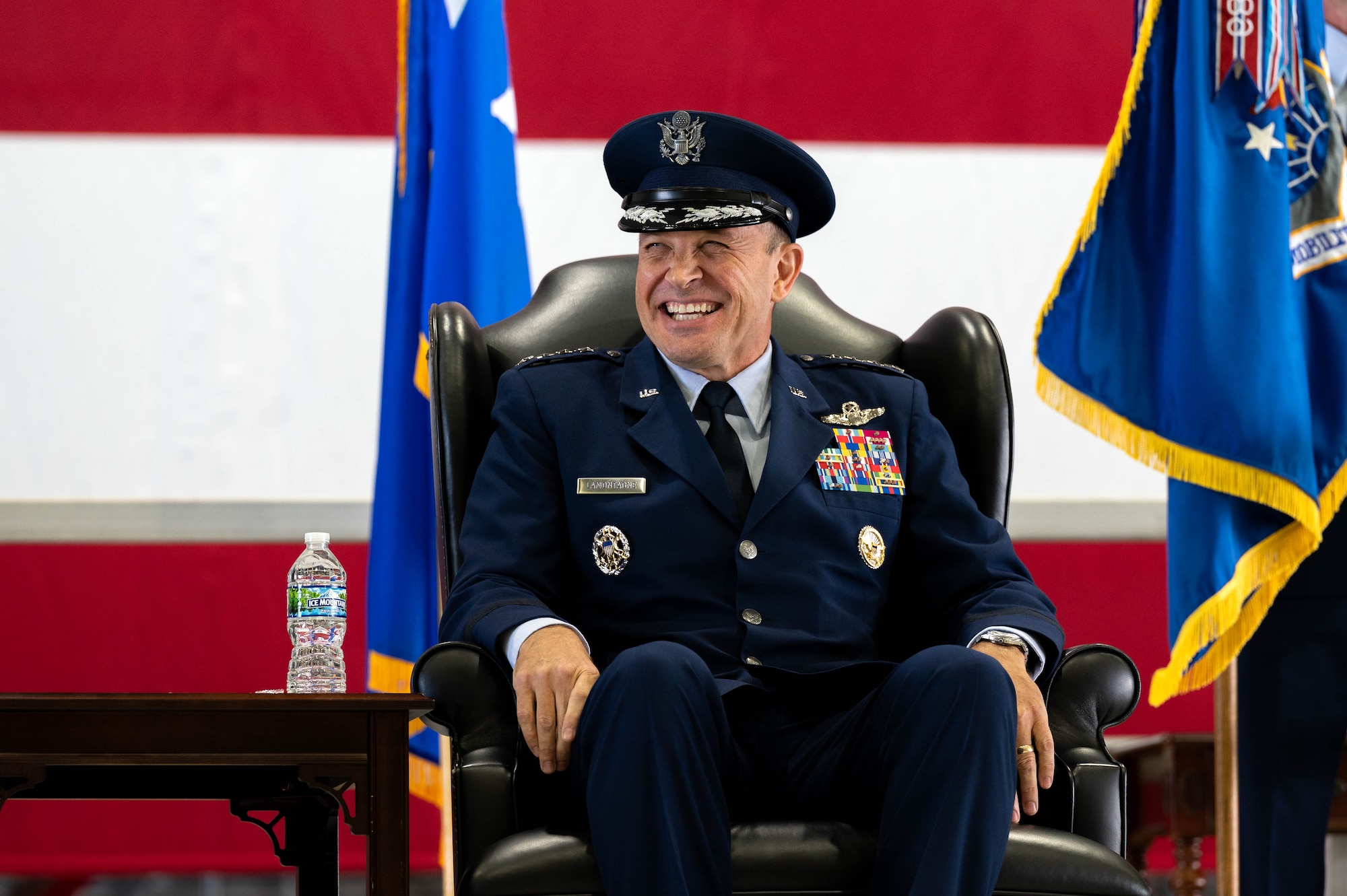 U.S. Air Force Gen. John D. Lamontagne laughs during a speech at the Air Mobility Command Change of Command ceremony at Scott Air Force Base, Illinois, Sept. 9, 2024. Lamontagne is the 16th commander of AMC, as it continues to provide rapid global mobility and sustainment for America’s Armed Forces.