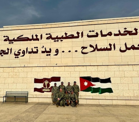 AQABA, JORDAN (May 17, 2024) – The global health engagement team poses for a photo during exercise Eager Lion 2024 in Aqaba, Jordan, May 17, 2024. Pictured from top left to right is Lt. Freddie Mawannay, officer-in-charge, U.S. Central Command; Hospital Corpsman 3rd Class Sean Sarmiento, Tactical Casualty Combat Care instructor, U.S. Navy Medical Readiness and Training Unit Bahrain; Chief Hospital Corpsman (FMF/EXW) Steven Taylor, senior enlisted leader, U.S. Naval Medical Readiness and Training Command (NMRTC) Sigonella; and Lt. Fremmy Cuadra, emergency department trauma nurse, NMRTC Sigonella. Pictured from bottom left to right is U.S. Navy Reserve (USNR) Hospital Corpsman 3rd Class Vivianna Mann, USNR Hospital Corpsman 2nd Class Zo Alonzo; and USNR Hospital Corpsman 1st Class Terri Archuleta. Eager Lion is designed to exchange military expertise, improve interoperability among partner nations, and considered the capstone of a broader U.S. military relationship with the Jordanian Armed Forces. (U.S. Navy photo by Chief Hospital Corpsman Steven Taylor/Released)