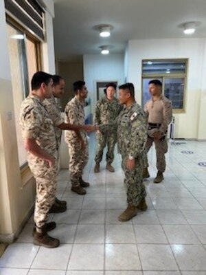 AQABA, JORDAN (May 18, 2024) – Lt. Freddie Mawannay, officer-in-charge, U.S. Central Command; Capt. Kyle Wagner, platoon commander, Fleet Antiterrorism Security Team Company Central Bahrain; and Lt. Fremmy Cuadra, emergency department trauma nurse, U.S. Naval Medical Readiness and Training Command Sigonella, meet with Jordanian medical forces at a coordinating meeting during exercise Eagle Lion 2024, May 18, 2024. Eager Lion is designed to exchange military expertise, improve interoperability among partner nations, and considered the capstone of a broader U.S. military relationship with the Jordanian Armed Forces. (U.S. Navy photo by Hospital Corpsman 1st Class Terri Archuleta/Released)