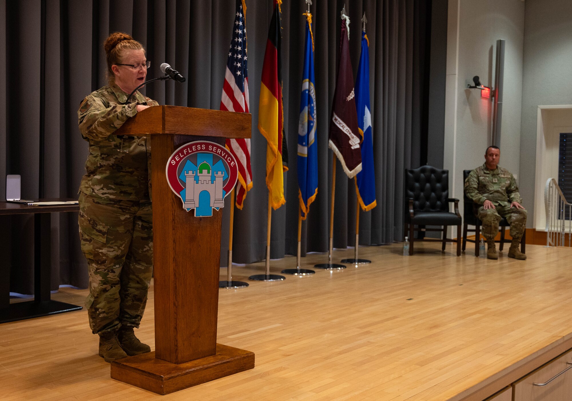 U.S. Air Force Brig. Gen. Adrienne L. Williams, 86th Airlift Wing commander, speaks during a Distinguished Flying Cross presentation for U.S. Air Force Master Sgt. Matthew Parker, 86th Medical Squadron surgical services superintendent, at Landstuhl Regional Medical Center, Germany, Sept. 6, 2024. Parker distinguished himself as a critical care air transport team cardiopulmonary technician during Operation Freedom’s Sentinel, acting in response to a mass casualty evacuation operation at Hamid Karzai International Airport, Afghanistan on August 27, 2021. (U.S. Air Force Photo by Senior Airman Jared Lovett)