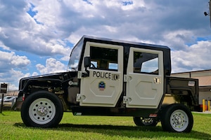 A low-speed electric vehicle is staged at Defense Logistics Agency Aviation in Richmond, Virginia