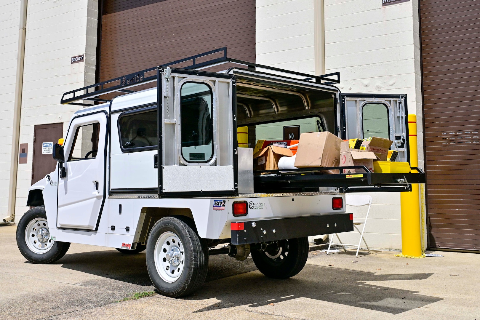 A low-speed electric vehicle is staged at Defense Logistics Agency Aviation in Richmond, Virginia
