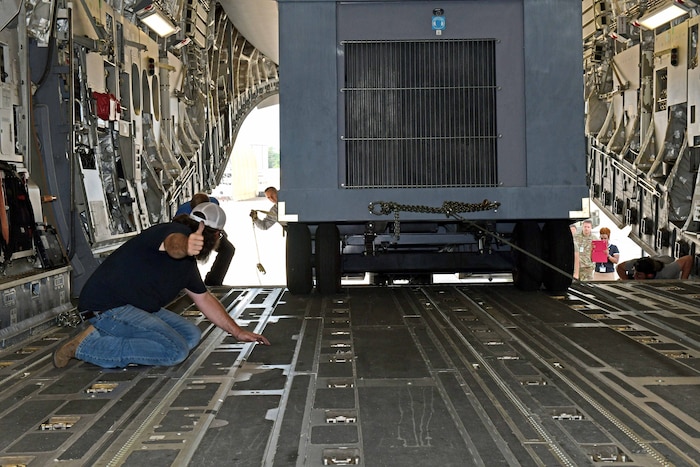 Men guiding trailer