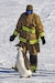 Pennsylvania Air National Guardsman Staff Sgt. Robbie Gregor from the 171st Air Refueling Wing gently encourages an emperor penguin to leave an active runway while supporting Operation Deep Freeze at the National Science Foundation's McMurdo Research Center, Antarctica, January, 2024. Operation Deep Freeze involves logistical support for scientific research including astrophysics, aeronomy, biology and ecosystems, geology and geophysics, glaciology, geomorphology, ice cores, geospace sciences, and ocean and climate systems (Courtesy Photo)