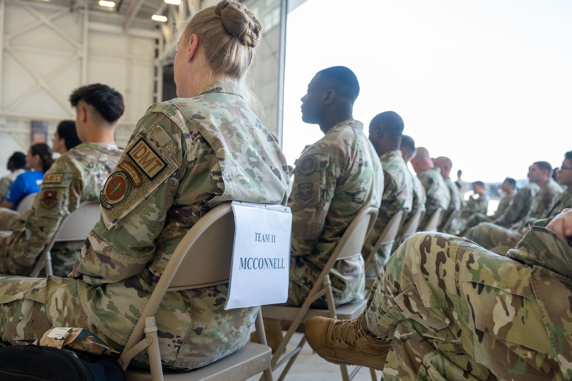 Airmen from the 22nd Medical Group attend the opening ceremony for the annual Medic Rodeo at Cannon Air Force Base, New Mexico, Aug. 12, 2024. This is the 15th iteration of the rodeo that challenges medical personnel through simulated scenarios. (U.S. Air Force photo by Senior Airman Felicia Przydzial)