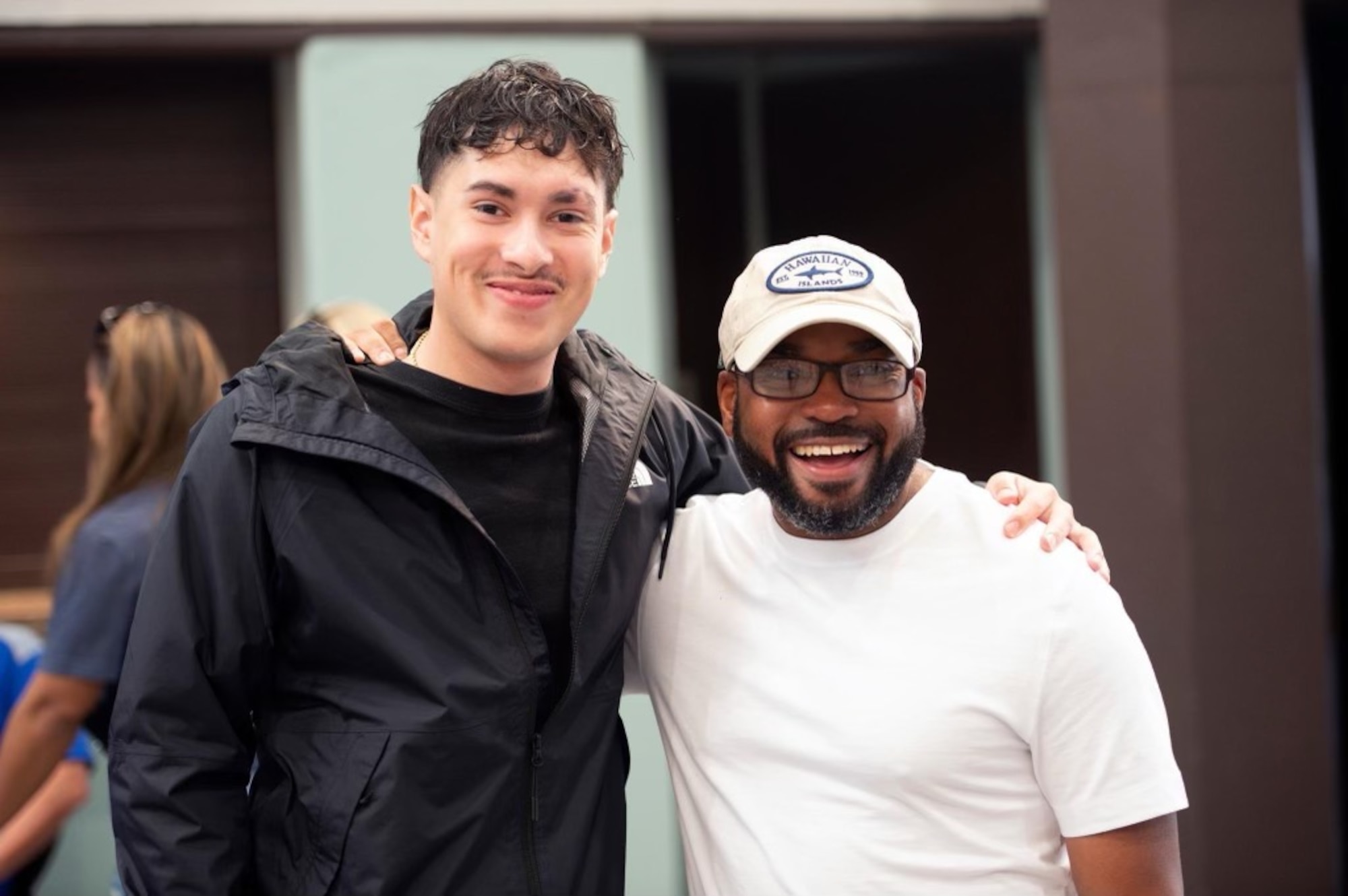 Anthony Dunn and Senior Airman Andrew Ordonez, pose for a photo.