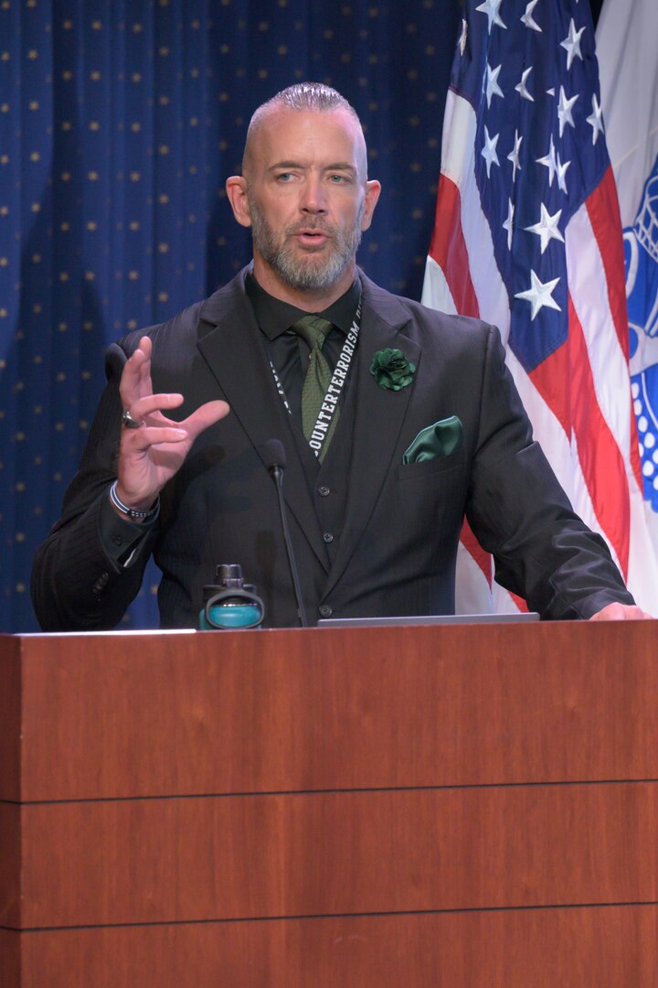 Defense Logistics Agency Emergency Management Program Manager James Johnston speaks during the National Preparedness Month observance