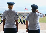 U.S. Air Force Col. Angelina Maguinness, 17th Training Wing commander, salutes passing Airmen as they graduate Basic Military Training at Joint Base San Antonio-Lackland, Texas, Sep. 5, 2024. Maguinness invited Goodfellow Air Force Base’s Honorary Commanders to experience trainees joining the Air Force and becoming Airmen. (U.S. Air Force photo by Senior Airman Zach Heimbuch)