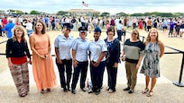 U.S. Air Force Col. Angelina Maguinness, 17th Training Wing commander, Chief Master Sgt. Khamillia Washington, 17th TRW command chief, and 17th TRW Honorary Commanders take a group photo after Basic Military Training graduation at Joint Base San Antonio-Lackland, Texas, Sep. 5, 2024. Honorary commanders are hand-selected to participate in base events and experience what it’s like to be part of the world’s greatest Air Force. (U.S. Air Force photo by Senior Airman Zach Heimbuch)
