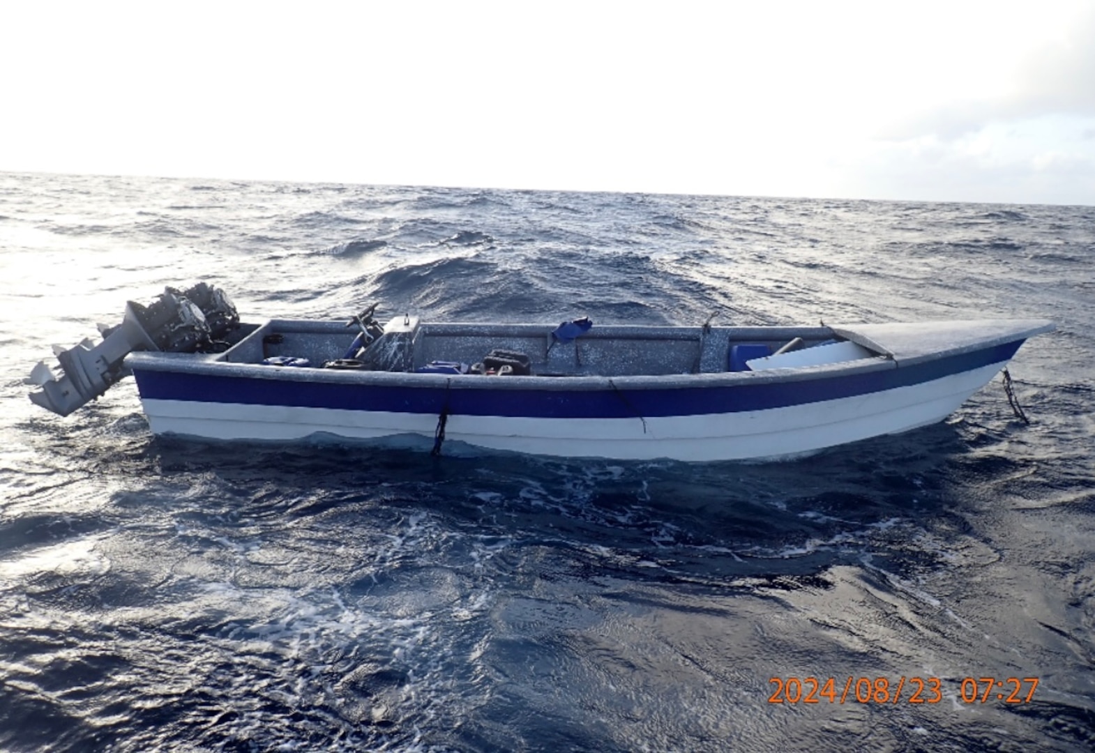 Crew members form U.S. Coast Guard Tactical Law Enforcement Detachment (LEDET) 111 and British Royal Navy team embarked aboard HMS Trent (P244) interdicts a go fast drug smuggling vessel in the international waters of the Caribbean Sea, Aug. 23, 2024. Two suspected smugglers and 1,018 pounds of illegal narcotics from this interdiction were transferred to federal custody for prosecution by the U.S. Department of Justice. (Courtesy image from United Kingdom Royal Navy)