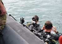 Sailors assigned to Explosive Ordnance Disposal Mobile Unit 8 conduct emergency action plan drills with the Bulgarian, Japanese and Ukrainian dive teams while underway off the coast of Varna, Bulgaria as part of the third serial of exercise Sea Breeze 2024