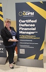 Emilie Herold-Webber, U.S. Army 20th Chemical, Biological, Radiological, Nuclear, Explosives Command deputy resource manager, poses for a photo at the Society for Defense Financial Managers' Professional Development Institue in Phoenix May 29, 2024. Harold-Webber said she prioritized brining first-time PDI attendees to help them see their importance within the organization and feel motivated to continue growing within the Department of Defense. (U.S. Army photo)
