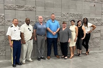 Members of the U.S. Army’s 20th Chemical, Biological, Radiological, Nuclear, Explosives Command pose for a photo at the 2024 Society of Defense Financial Managers Professional Development Institute in Phoenix May 29, 2024. Pictured from the left are Staff Sgt. Pheng Thao, William Ruffin, Dale Ryan, Kevin Funcheon, Emilie Herold-Webber, Keila Andinocolon, Cheryl Morgan and Janita Sims. (U.S. Army photo)