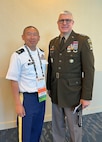 Staff Sgt. Pheng Thao, U.S. Army 20th Chemical, Biological, Radiological, Nuclear, Explosives Command senior budget analyst, poses for a photo with Lt. Gen. Paul A. Chamberlain, military deputy to the Assistant Secretary of the Army for Financial Management and Comptroller, during the 2024 SDFM PDI at the Phoenix Convention Center May 29, 2024. The PDI was a chance for the Army’s finance and comptroller organizations to come together, share best practices, solve shared problems, and professionally develop Soldiers and Army civilian employees. (U.S. Army photo)