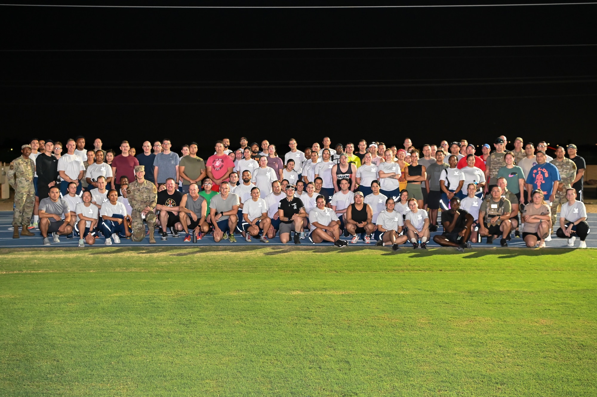 Members of the 944th Fighter Wing gather for a group photo before starting the 9/11 Remembrance 5K on Sept. 8, 2024, at Luke Air Force Base, Ariz. The event, held during the Unit Training Assembly, honored those who died on Sept. 11, 2001, and the first responders who have since passed away. (U.S. Air Force photo by Senior Airman Alexis Orozco)