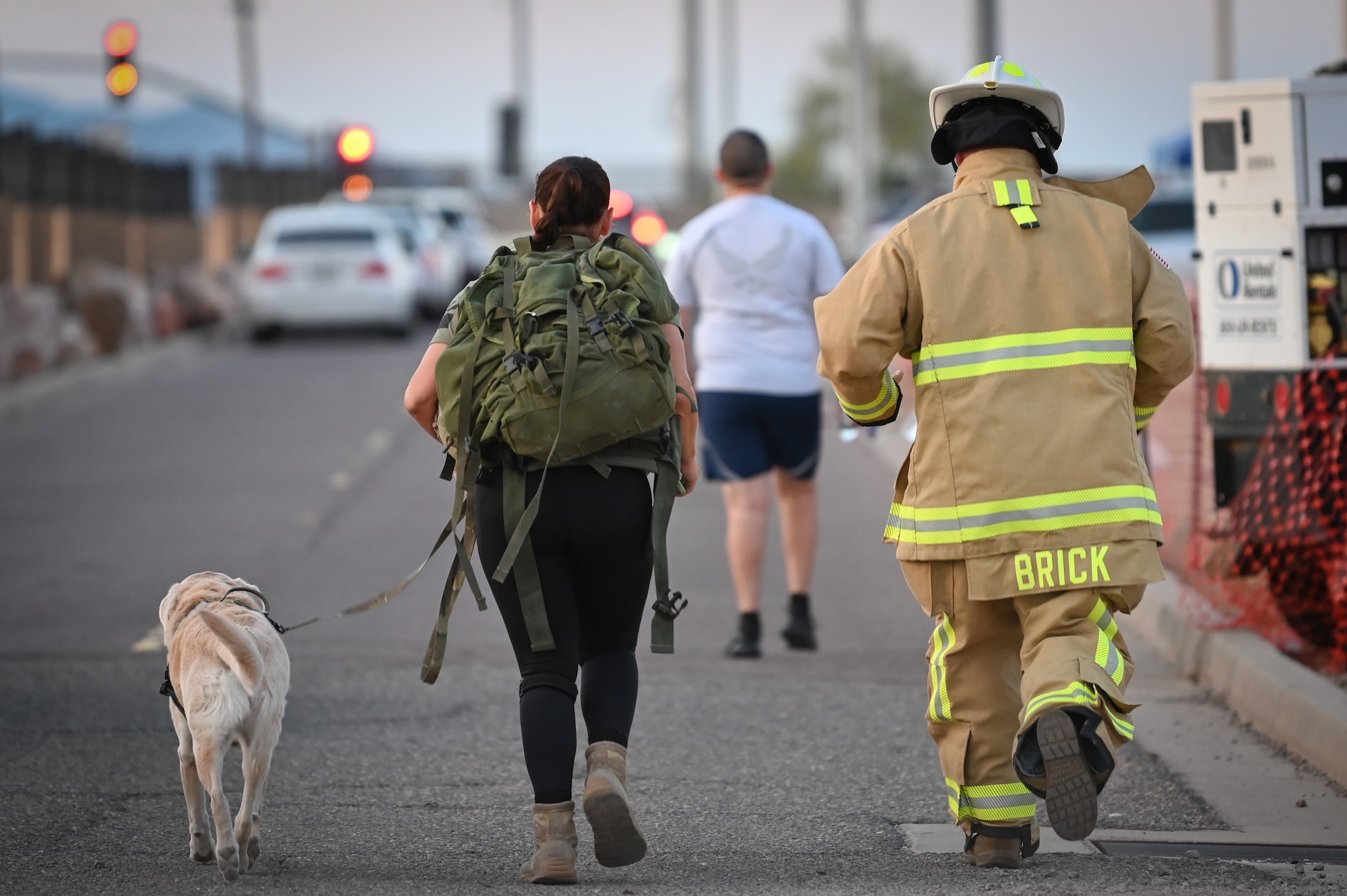 Participants in the 9/11 Remembrance 5K make their way through the course on Sept. 8, 2024, at Luke Air Force Base, Ariz. Staff Sgt. Sara Weaver, 944th Civil Engineer Squadron, organized the event to honor those lost on 9/11 and ensure the memory of the day continues. (U.S. Air Force photo by Senior Airman Alexis Orozco)