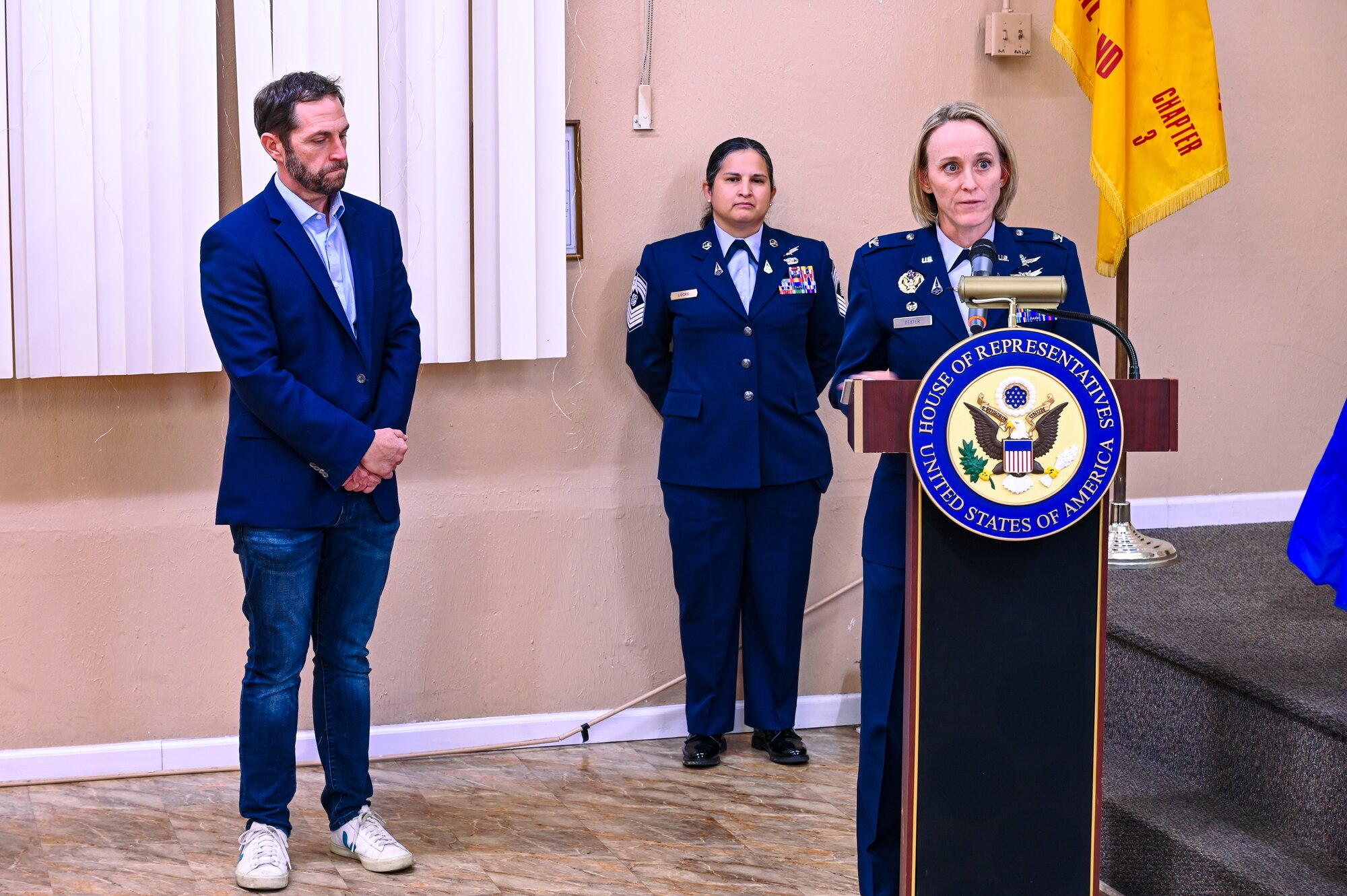 group of people delivering formal speech