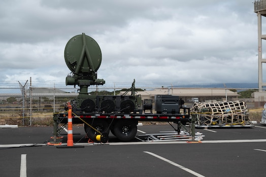  Part of a mobile constellation control station sits outside near the flightline at Joint Base Pearl Harbor Hickam, Hawaii, Aug. 27, 2024. The equipment has been flown in and assembled as part of a contingency operations exercise meant to test the viability of a new location. (U.S. Air Force photo by Technical Sgt. Tarelle Walker)