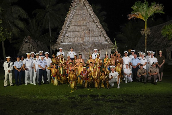 Service members assigned to Pacific Partnership 2024-2 and traditional Yapese dancers pose for a photo in Yap, Federated States of Micronesia, (U.S. Navy photo by Mass Communication Specialist Seaman Gavin Arnoldhendershot)