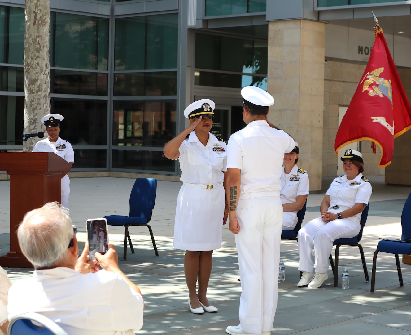 Chief Petty Officer Richard Reveles renders the first salute to his wife, Ensign Grace Joan Reveles, during her commissioning ceremony held Sept. 6, 2024, on the Naval Hospital Camp Pendleton Medal of Honor Promenade. Having obtained both her associate degree and bachelor’s degree in nursing while serving on active duty as a corpsman, Reveles was commissioned into the Navy Nurse Corps via the Direct Accession Program.