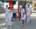 Ensign Grace Joan Reveles is administered the oath of office by Lt. Cmdr. Nancy Helfrich during Reveles’ commissioning ceremony held Sept. 6, 2024, on the Naval Hospital Camp Pendleton Medal of Honor Promenade. Having obtained both her associate degree and bachelor’s degree in nursing while serving on active duty as a corpsman, Reveles was commissioned into the Navy Nurse Corps via the Direct Accession Program.