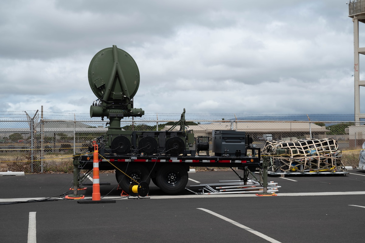 Part of a mobile constellation control station sits outside near the flightline at Joint Base Pearl Harbor Hickam, Hawaii, Aug. 27, 2024. The equipment has been flown in and assembled as part of a contingency operations exercise meant to test the viability of a new location. (U.S. Air Force photo by Technical Sgt. Tarelle Walker)